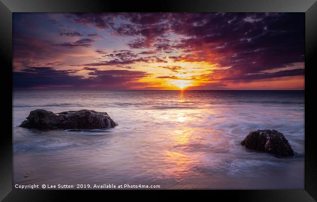 Whistling sands sunset Framed Print by Lee Sutton