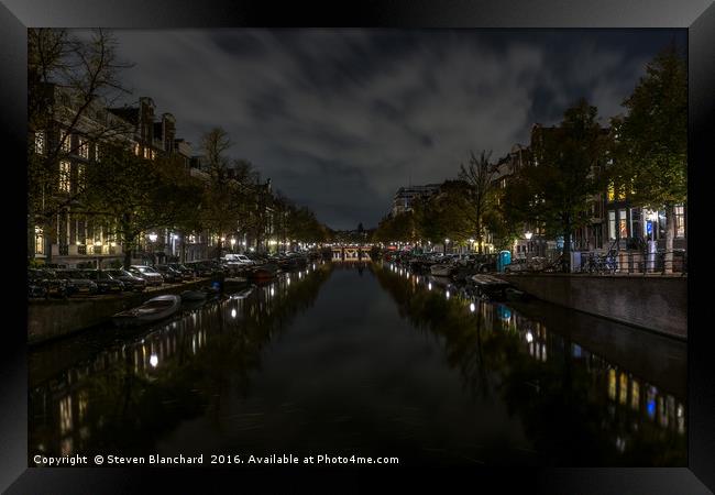 Amsterdam central canal at night  Framed Print by Steven Blanchard