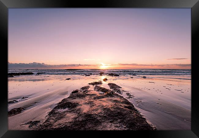  Sun setting on the Beach Framed Print by Nick Rowland