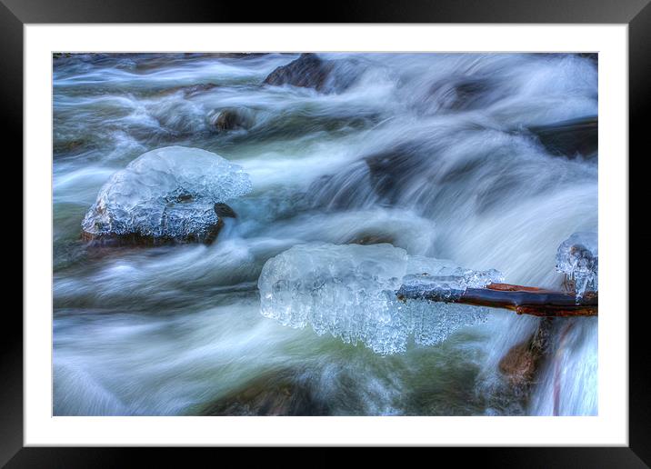 Icicles on rocks over river Framed Mounted Print by S Fierros