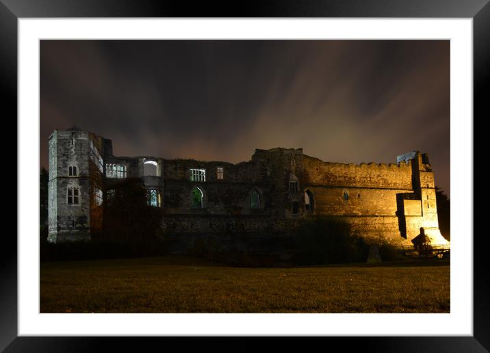 Newark Castle backlit at night Framed Mounted Print by Paul Phillips