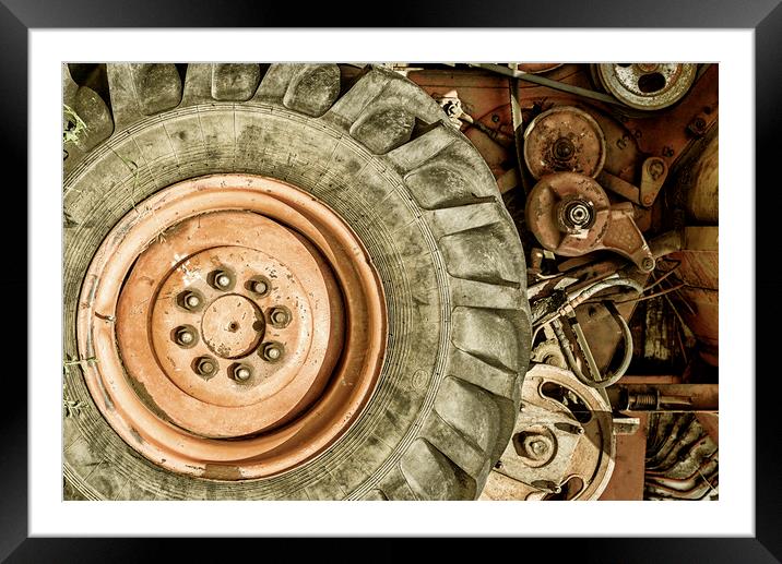 Old Combine Wheel Framed Mounted Print by John Williams
