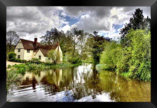 Storm clouds over Willy Lott's Cottage - Flatford  Framed Print by David Stanforth