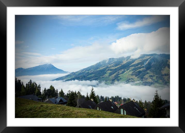 Switzerland Mountains with low cloud Framed Mounted Print by Darren Willmin
