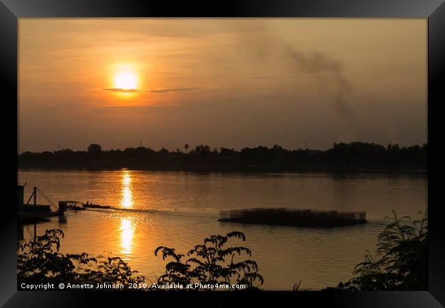 Sunset on the Mekong River Framed Print by Annette Johnson