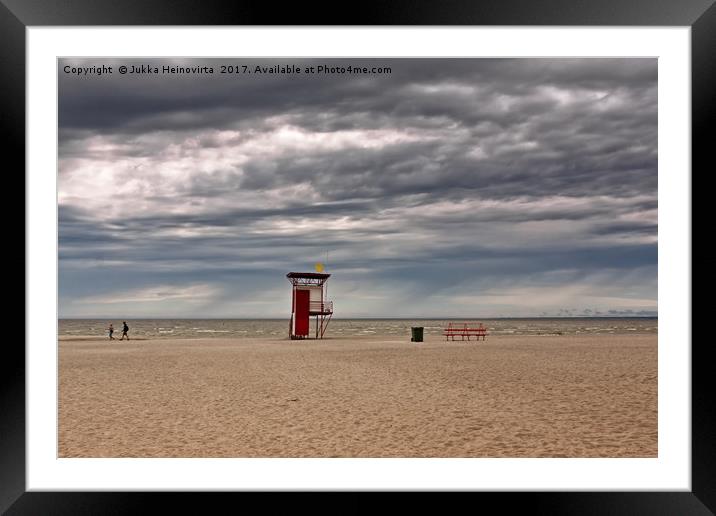 Rain Clouds Over The Beach Framed Mounted Print by Jukka Heinovirta