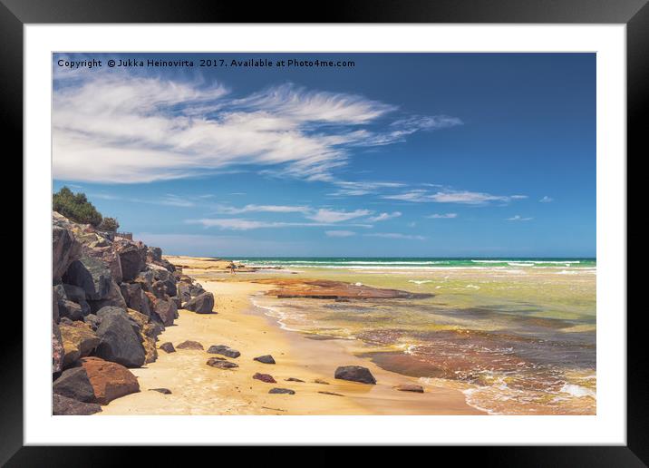 Surfer Returning From The Waves Framed Mounted Print by Jukka Heinovirta