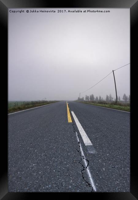 Crack On The Road Framed Print by Jukka Heinovirta