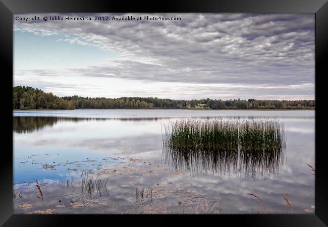 Reflections of the Autumn Lake Framed Print by Jukka Heinovirta