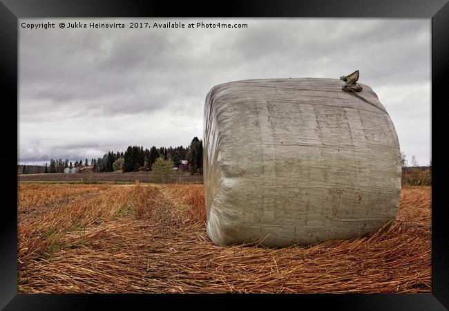 Hay Roll Under The Autumn Skies Framed Print by Jukka Heinovirta
