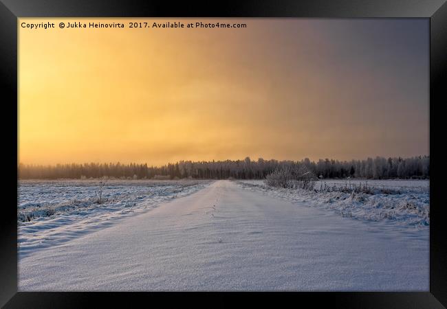 Snowy Road In The Winter Sunrise Framed Print by Jukka Heinovirta