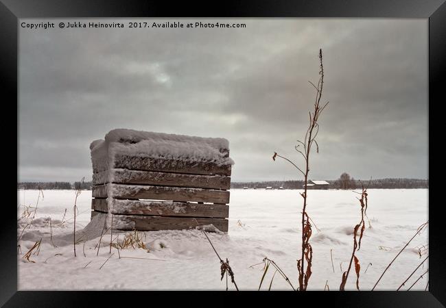 Snow Covered Wooden Crate On The Fields Framed Print by Jukka Heinovirta