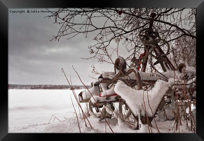 Snow Covered Farming Equipment Framed Print by Jukka Heinovirta