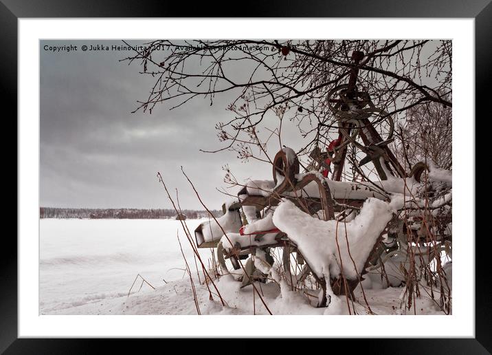 Snow Covered Farming Equipment Framed Mounted Print by Jukka Heinovirta