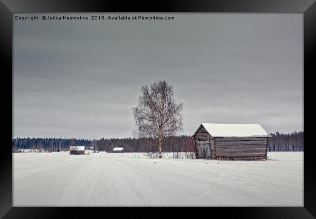 Snowy Road To The Forest Framed Print by Jukka Heinovirta