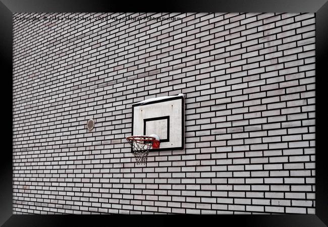 Basketball Hoop On A Brick Wall Framed Print by Jukka Heinovirta