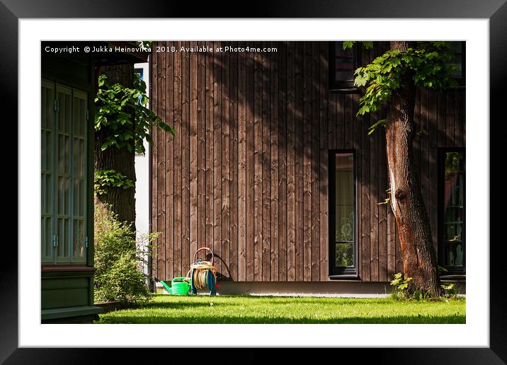 Garden Tools Beside A Modern Building Framed Mounted Print by Jukka Heinovirta