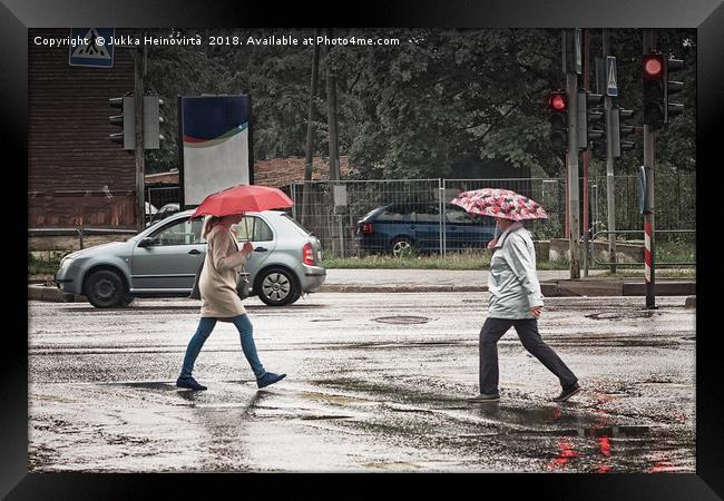 Two Umbrellas In The Crossing Framed Print by Jukka Heinovirta