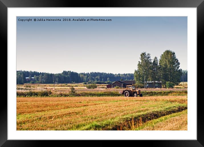 Old Tractor On The Fields Framed Mounted Print by Jukka Heinovirta