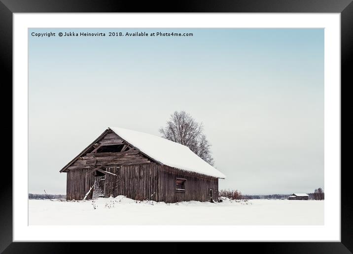Old Barn Houses On The Snowy Fields Framed Mounted Print by Jukka Heinovirta