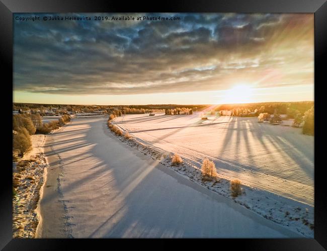 Sunrise Over The Winter Fields Framed Print by Jukka Heinovirta