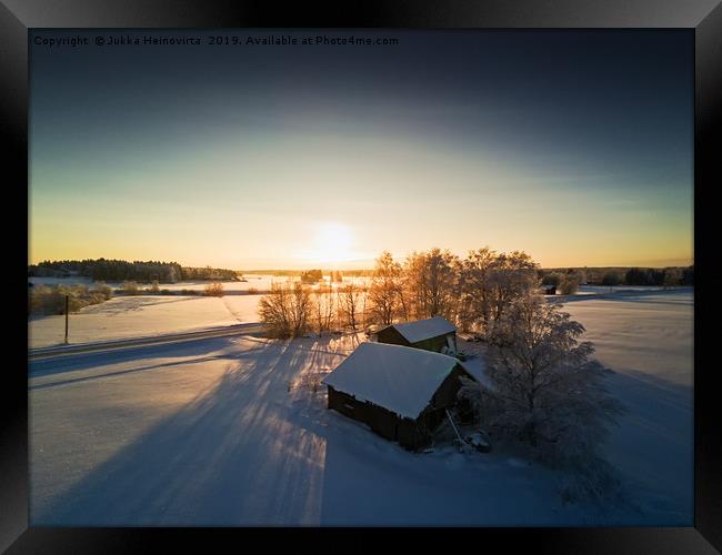 Farm Houses In The Winter Sunset Framed Print by Jukka Heinovirta