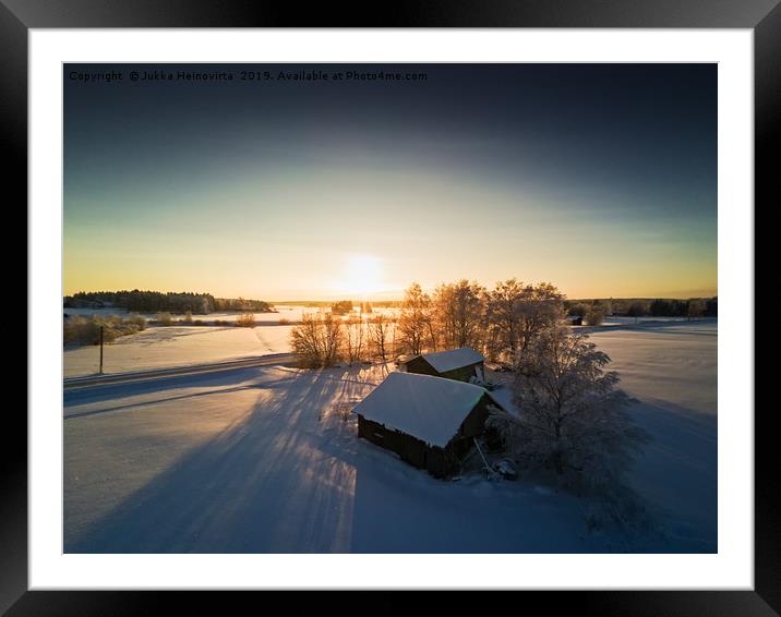 Farm Houses In The Winter Sunset Framed Mounted Print by Jukka Heinovirta