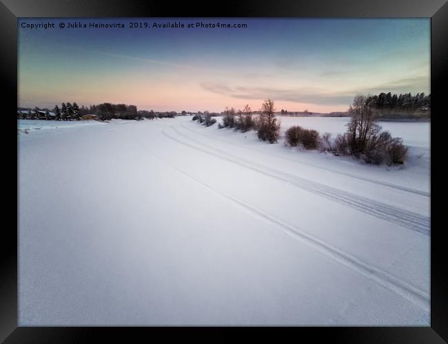 Icy River In The Sunset Framed Print by Jukka Heinovirta