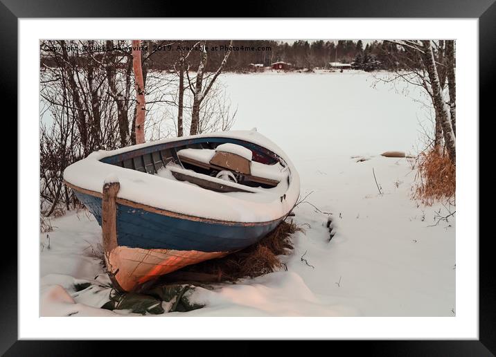 Old Fishing Boat Covered With Snow Framed Mounted Print by Jukka Heinovirta