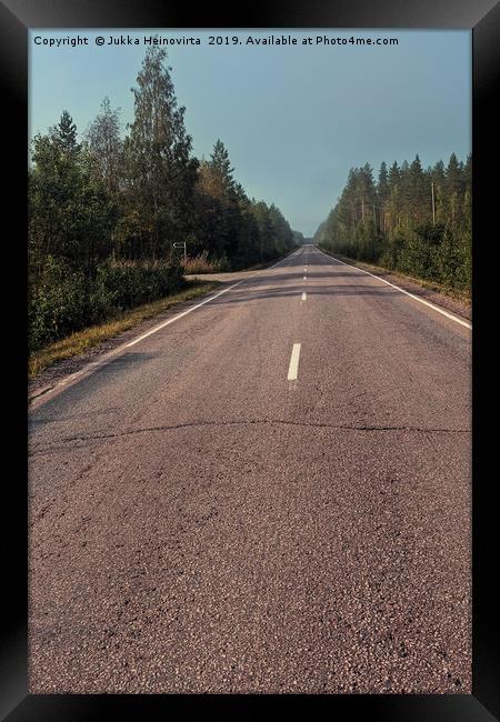 Empty Road On A Misty Morning Framed Print by Jukka Heinovirta
