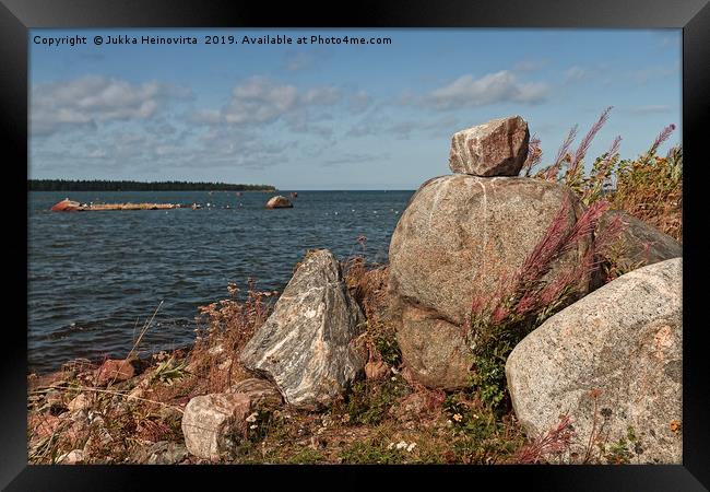 Pile Of Rocks By The Sea Framed Print by Jukka Heinovirta