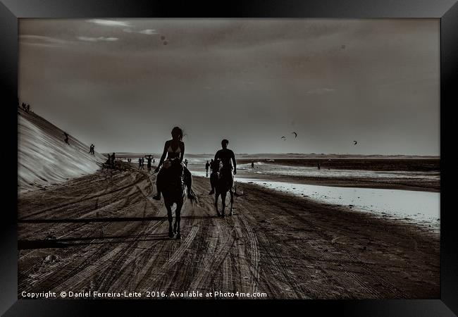 Young Couple Riding Horses at the Beach Framed Print by Daniel Ferreira-Leite