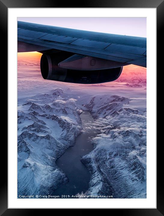 Flying over Greenland at 38000ft Framed Mounted Print by Craig Doogan