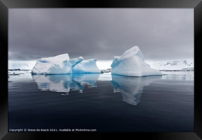 Icebergs on a calm evening in the Antarctic Framed Print by Steve de Roeck