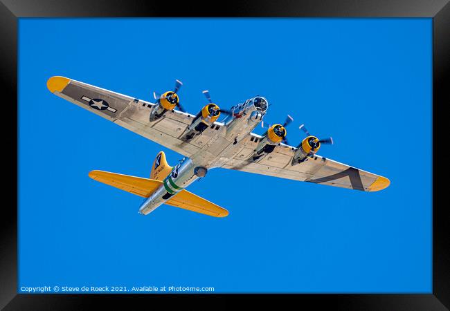 Boeing B17 Flies Overhead In Deep Blue Sky Framed Print by Steve de Roeck