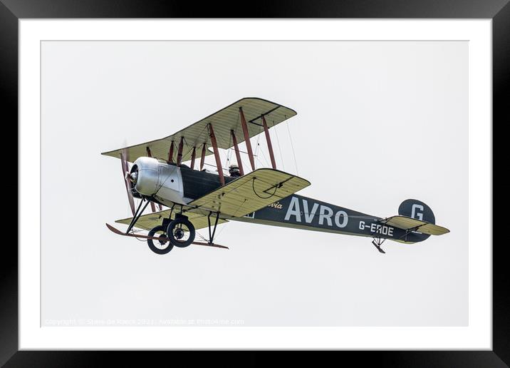 Avro 504K flies past in a cloudy sky Framed Mounted Print by Steve de Roeck