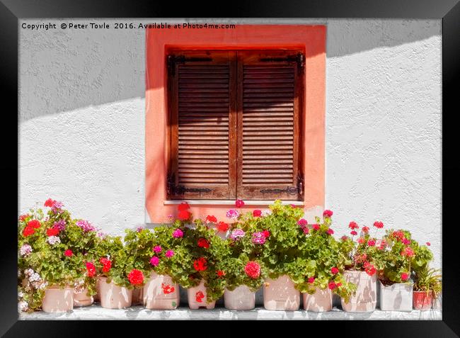 Cretan window dressing. Framed Print by Peter Towle