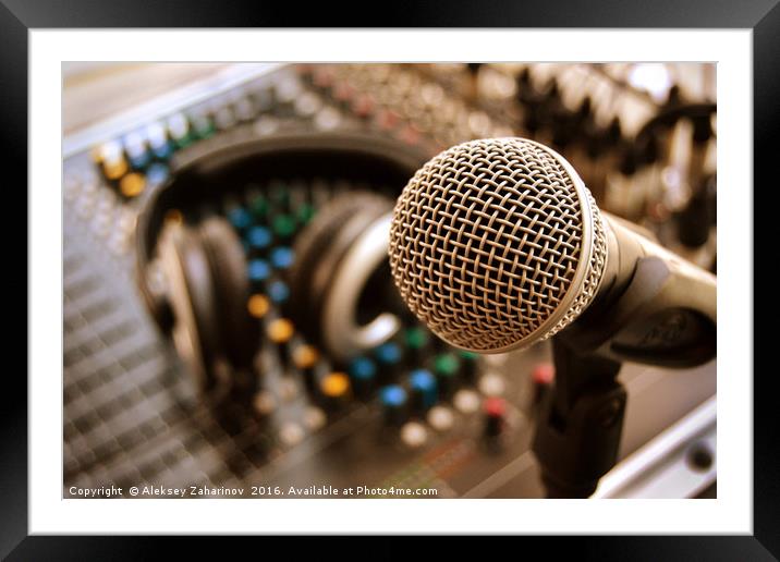 A microphone and headphones Framed Mounted Print by Aleksey Zaharinov