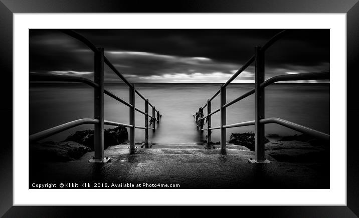 Railings into the water Framed Mounted Print by Angela H