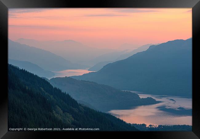 Sunrise over a misty Loch Lomond Framed Print by George Robertson