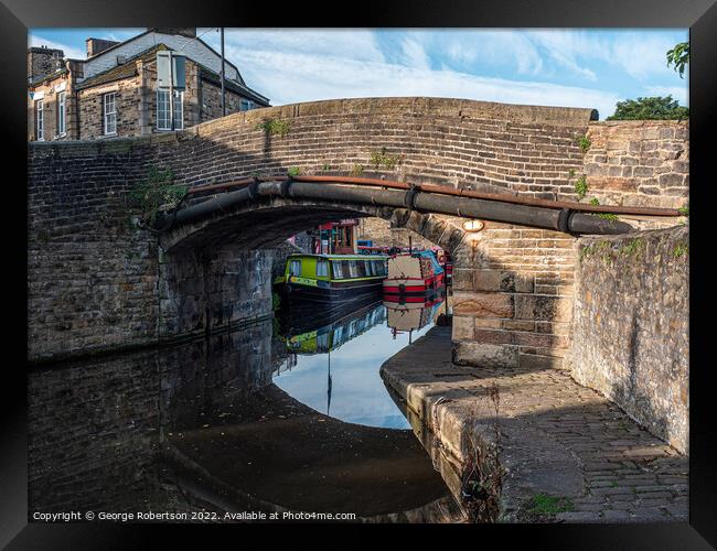 Narrowboats on the canal Framed Print by George Robertson
