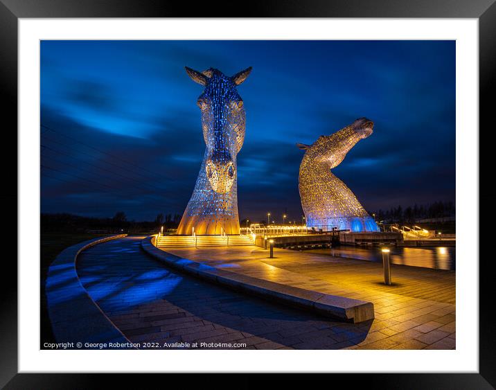 The Kelpies in Blue and Yellow colours in support of Ukraine Framed Mounted Print by George Robertson