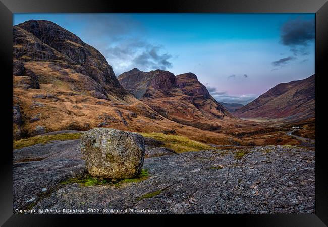 An Erratic rock above Glencoe Valley at sunrise Framed Print by George Robertson