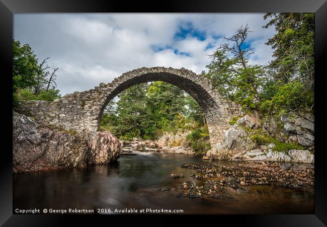 Old stone bridge in the village of Carrbridge Framed Print by George Robertson
