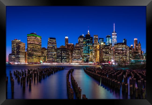 The New York City Skyline at night from DUMBO Broo Framed Print by George Robertson