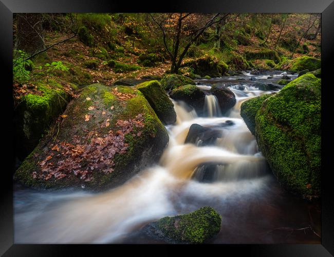 Waterfalls on a small brook Framed Print by George Robertson