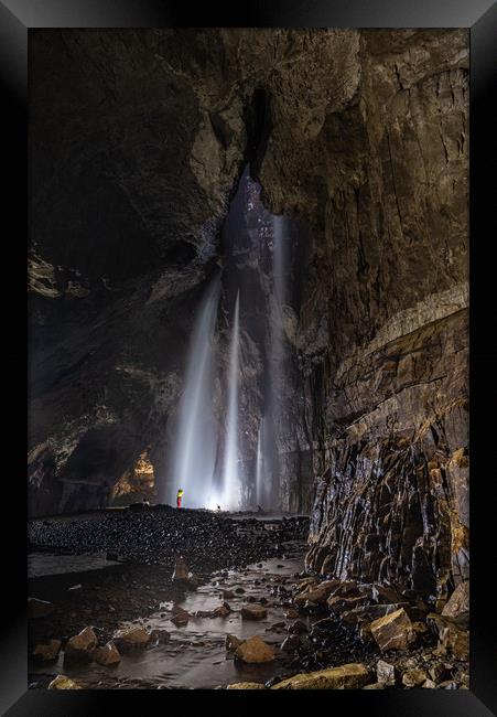 Caver in Gaping Gill Cavern Framed Print by George Robertson