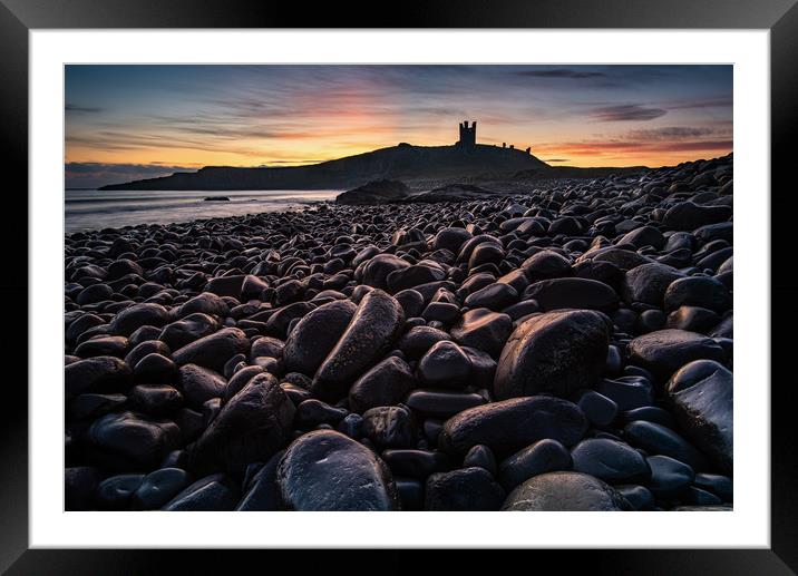 First light on the rocks at Dunstanburgh Castle Framed Mounted Print by George Robertson