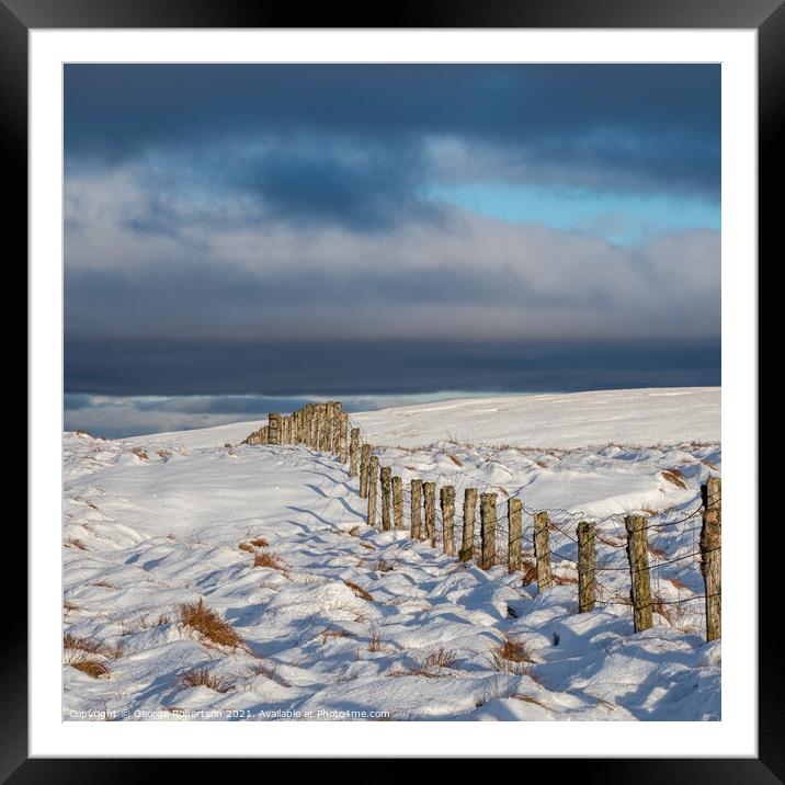 A fence line in Snow Framed Mounted Print by George Robertson