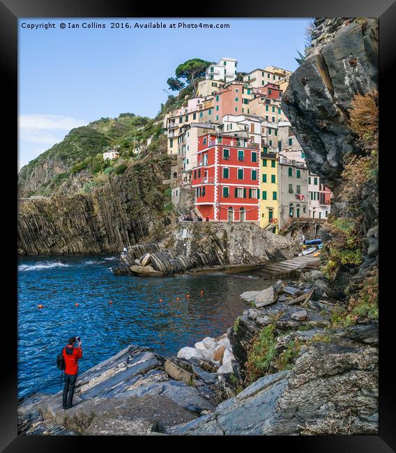 Taking Pictures of Riomaggiore Framed Print by Ian Collins